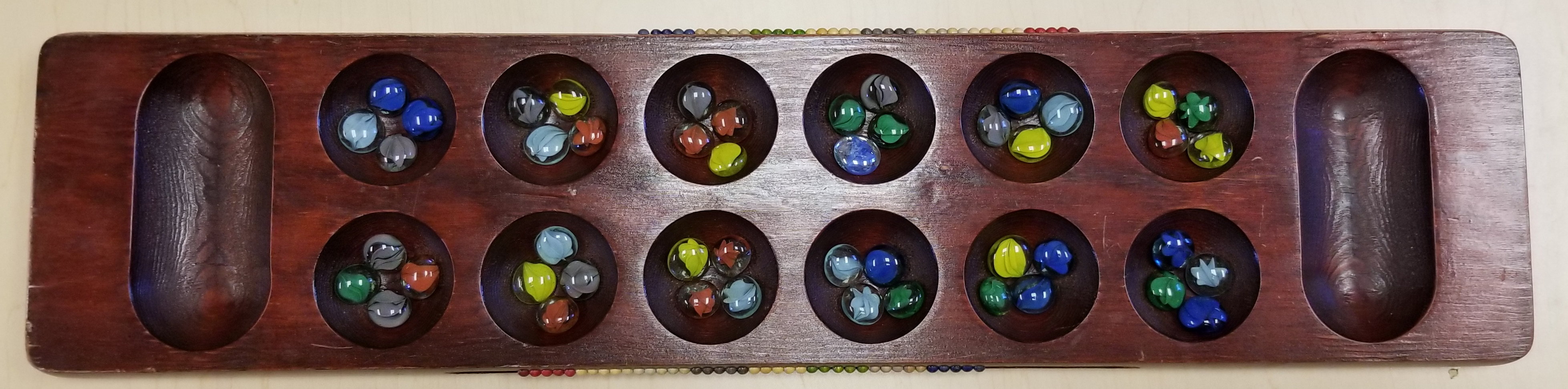 Standard Initial Mancala Board State shown with original Kalah Game Company board